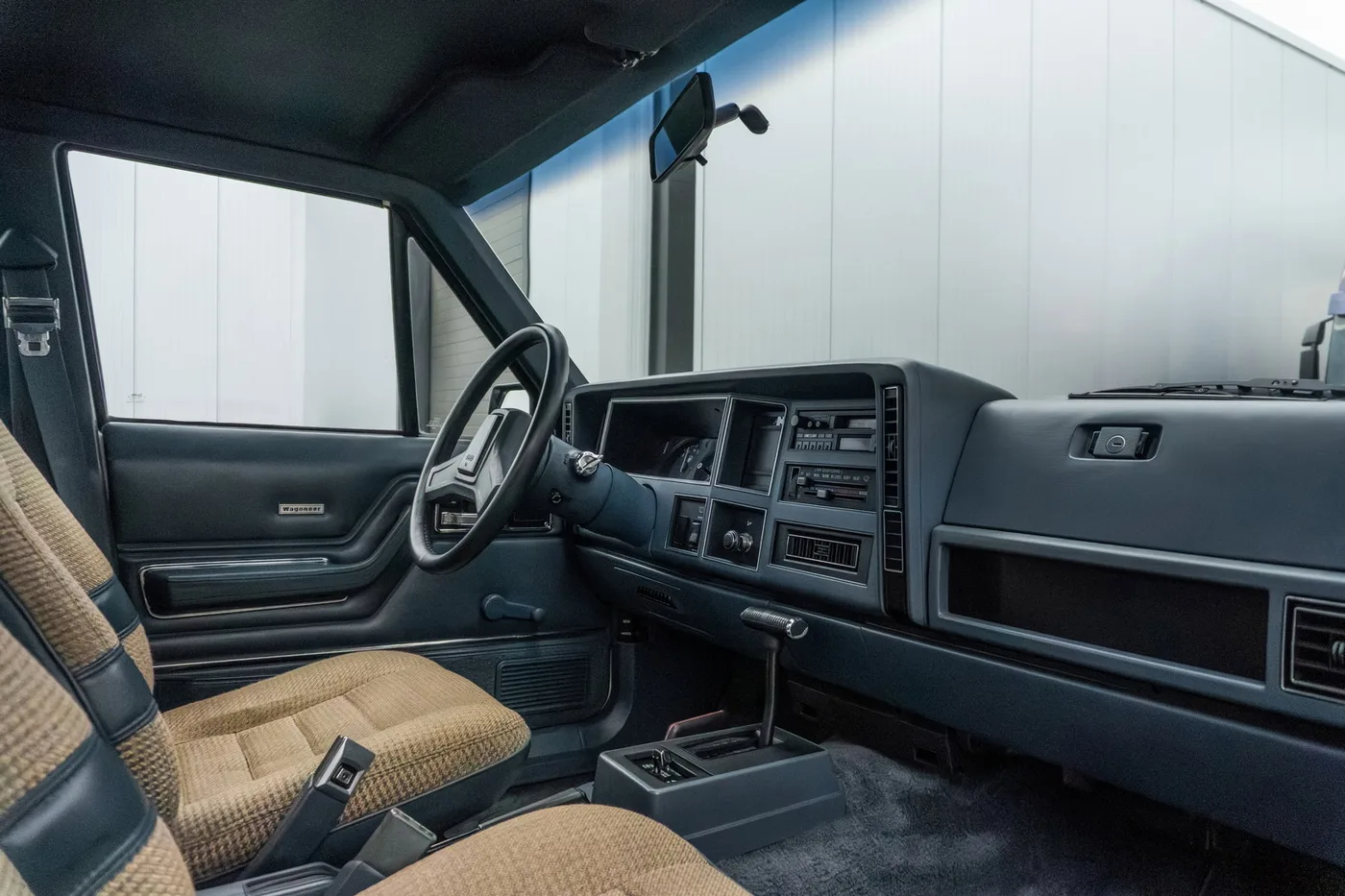 1984 Jeep Wagoneer offered by a supercar dealer in Woerden, Netherlands, photo 5 of 25