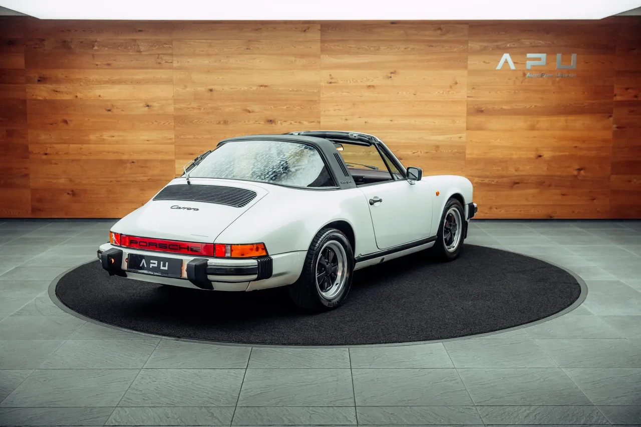 1985 Porsche 911 Targa proposée par un concessionnaire spécialisé à Uznach, Suisse, photo principale