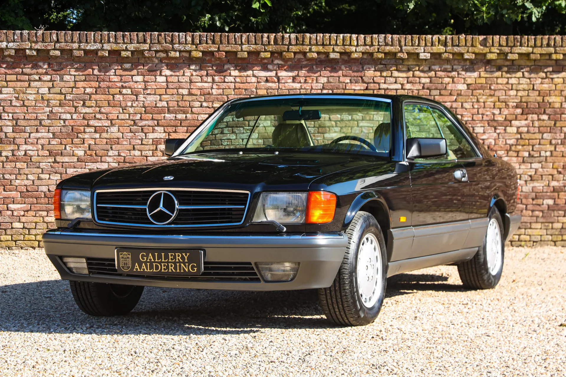 1987 Mercedes-Benz 560 SEC offered by a specialist dealer in Brummen, Netherlands, main photo