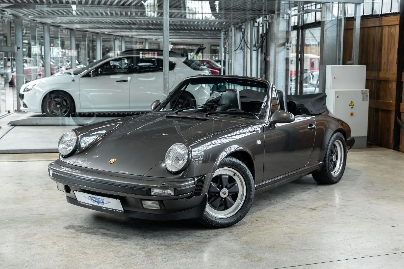 1989 Porsche 911 Carrera Cabriolet offered by a specialist dealer in Neuss, Germany, main photo