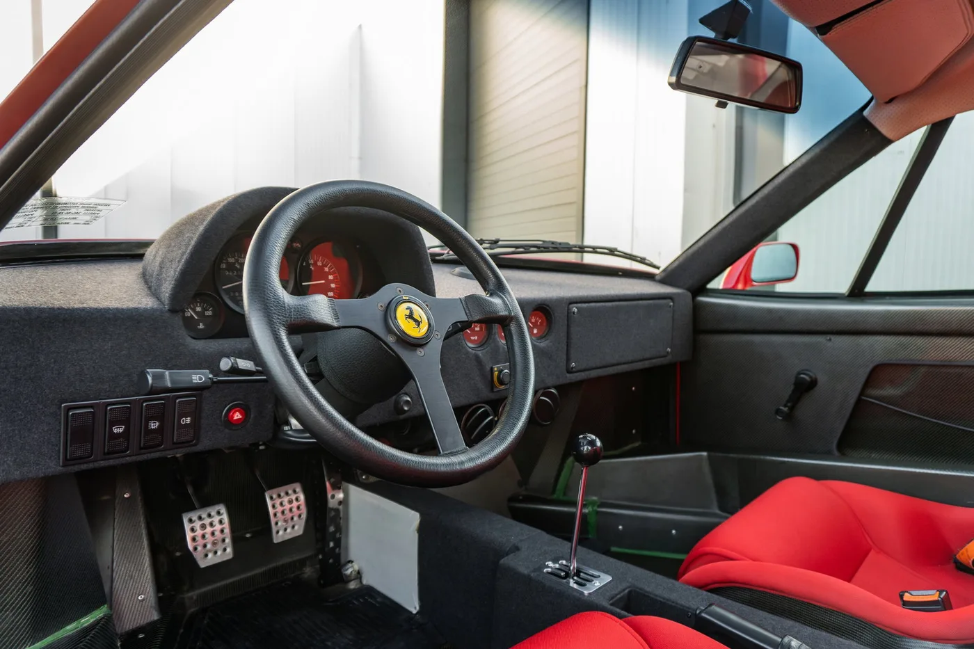 1990 Ferrari F40 offered by a supercar dealer in Woerden, Netherlands, photo 3 of 25
