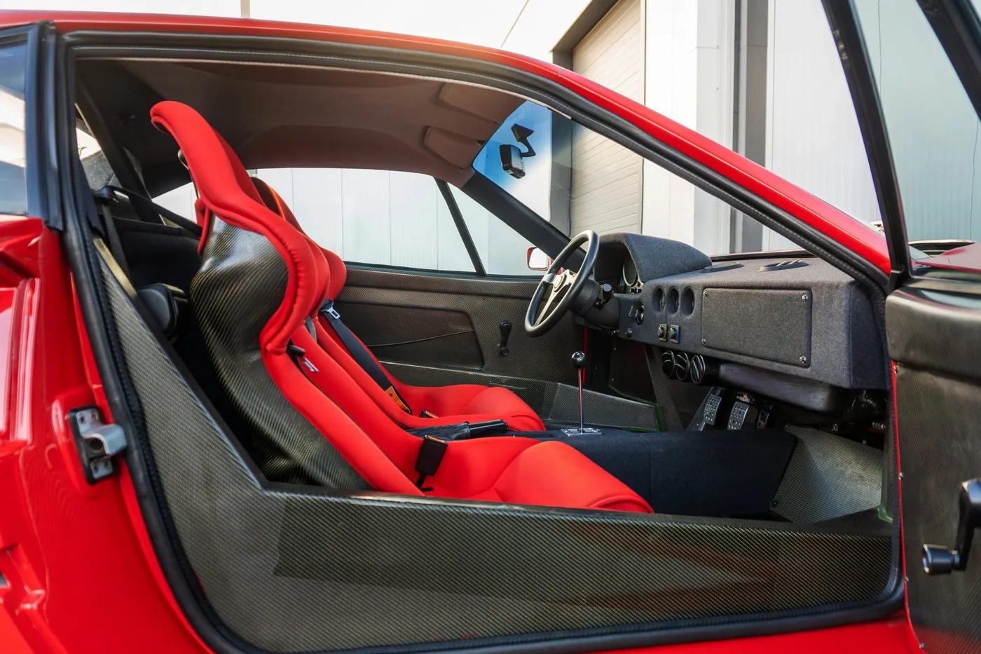 1990 Ferrari F40 offered by a supercar dealer in Woerden, Netherlands, photo 16 of 25