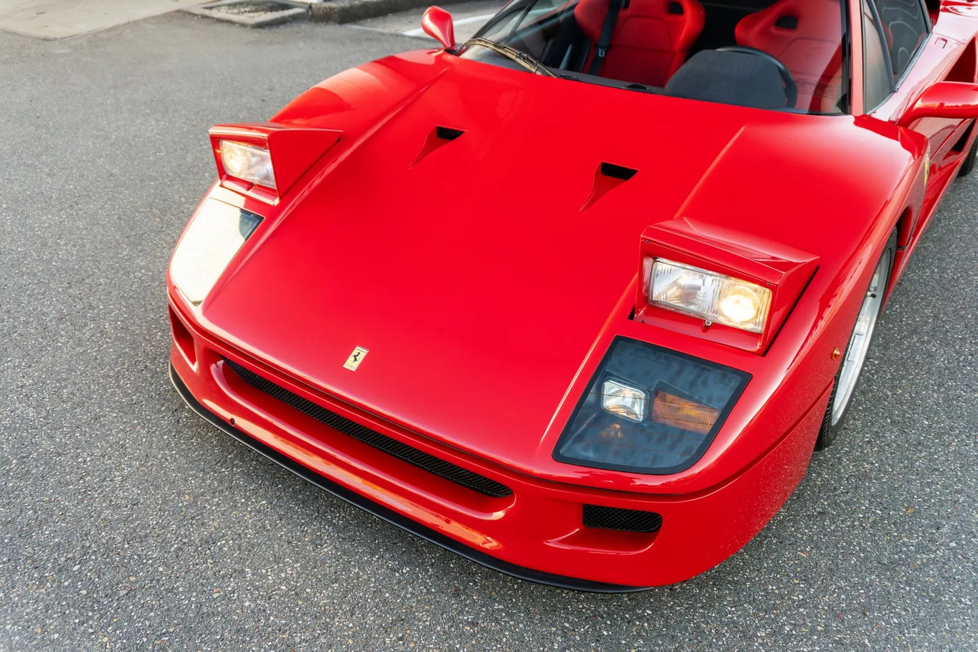 1990 Ferrari F40 offered by a supercar dealer in Woerden, Netherlands, photo 22 of 25