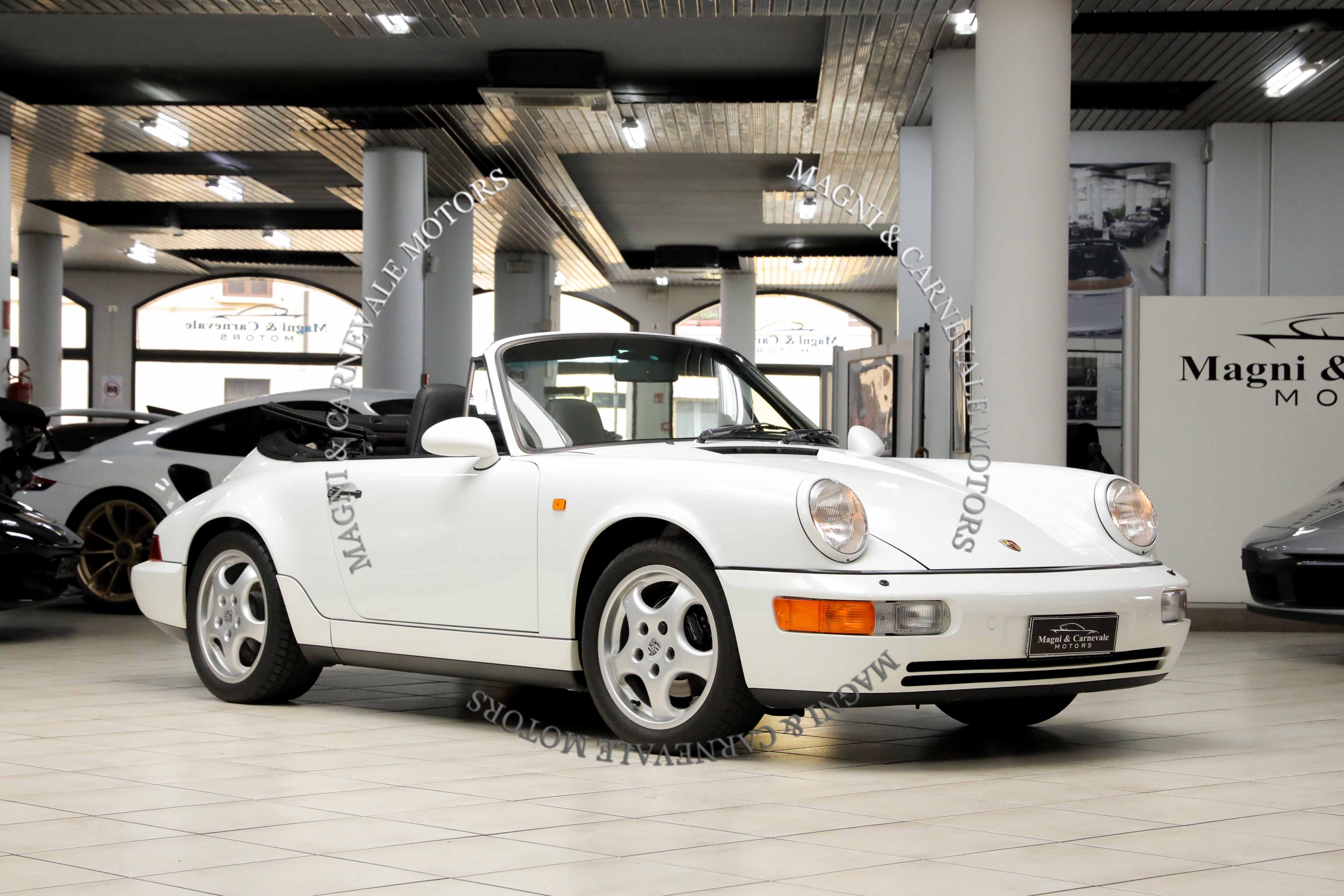 1994 Porsche 911 Carrera 4 Cabriolet offered by a specialist dealer in Milan, Italy, photo 4 of 20