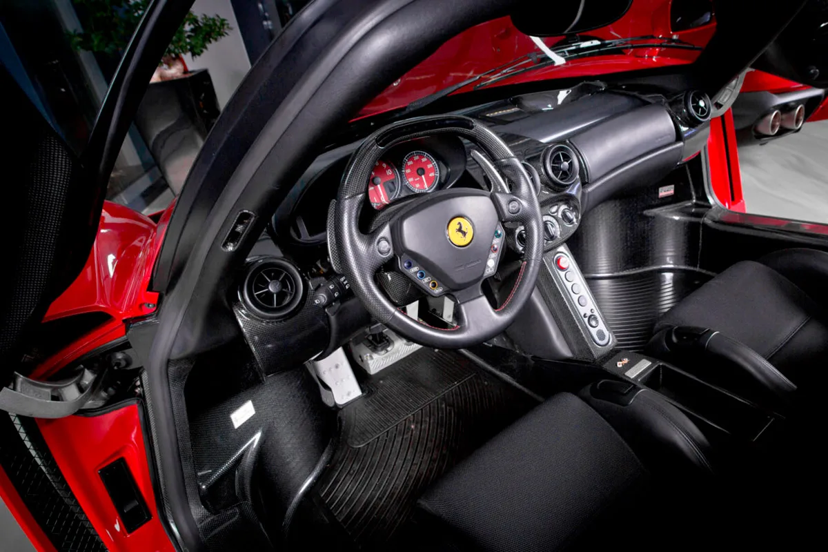 2004 Ferrari Enzo Rosso Corsa offered by a specialist dealer in Cologne, Germany, photo 14 of 24
