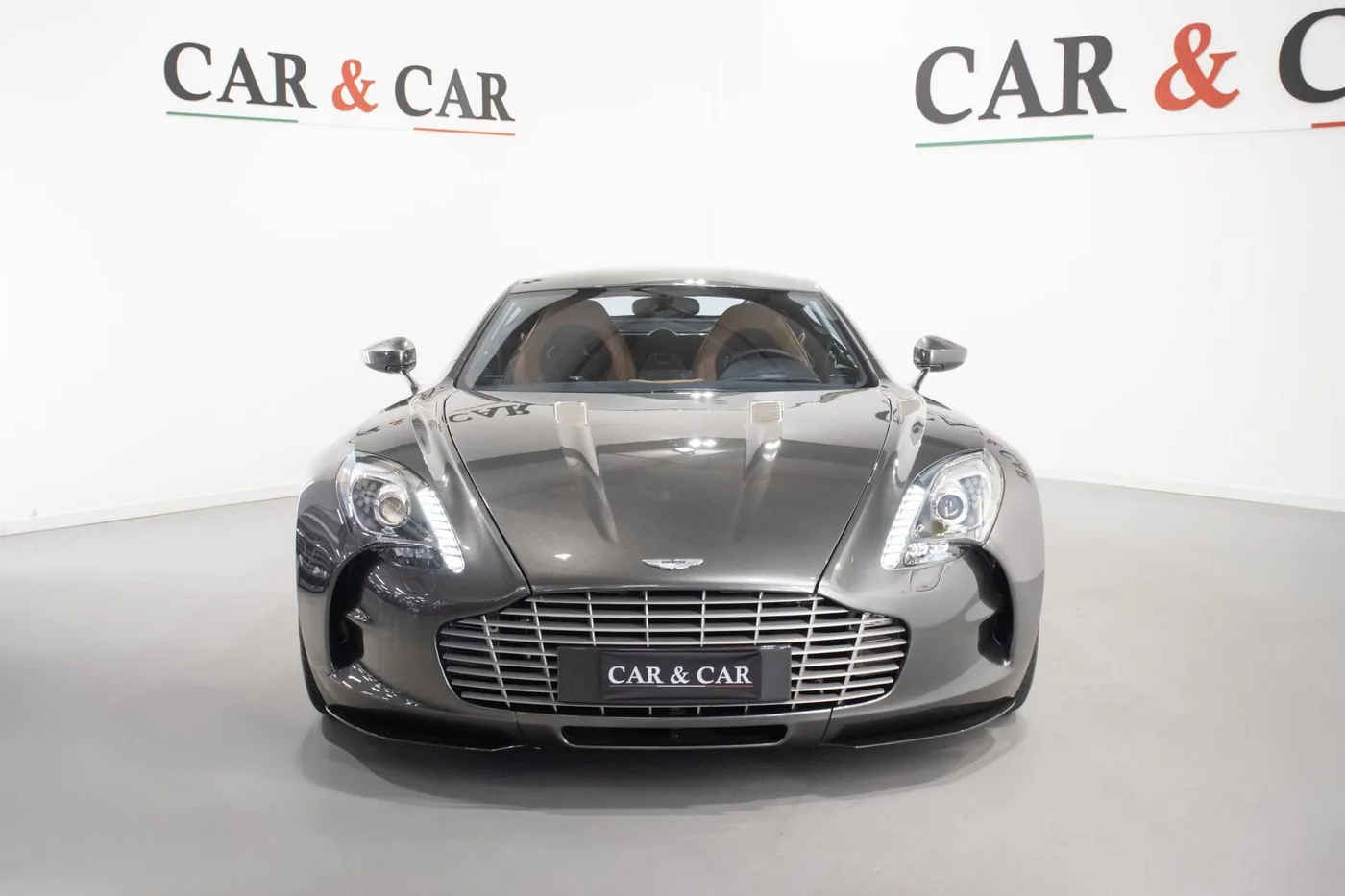 2012 Aston Martin One-77 offered by a supercar dealer in Zibido San Giacomo, Italy, photo 3 of 22