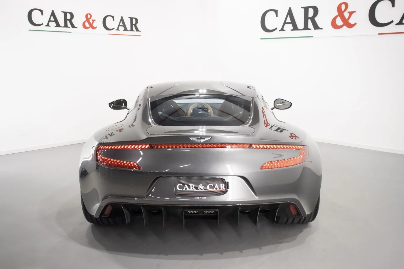 2012 Aston Martin One-77 offered by a supercar dealer in Zibido San Giacomo, Italy, photo 4 of 22