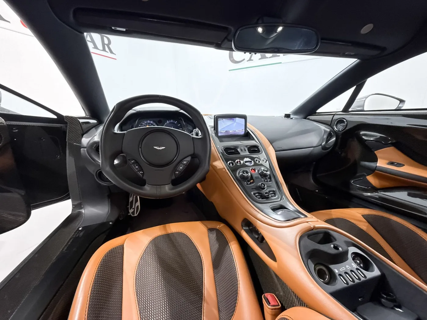 2012 Aston Martin One-77 offered by a supercar dealer in Zibido San Giacomo, Italy, photo 12 of 22