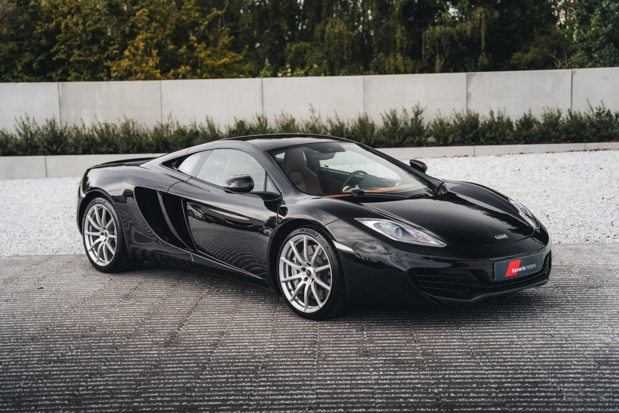 2012 McLaren MP4-12C offered by a specialist dealer in Harelbeke, Belgium, main photo