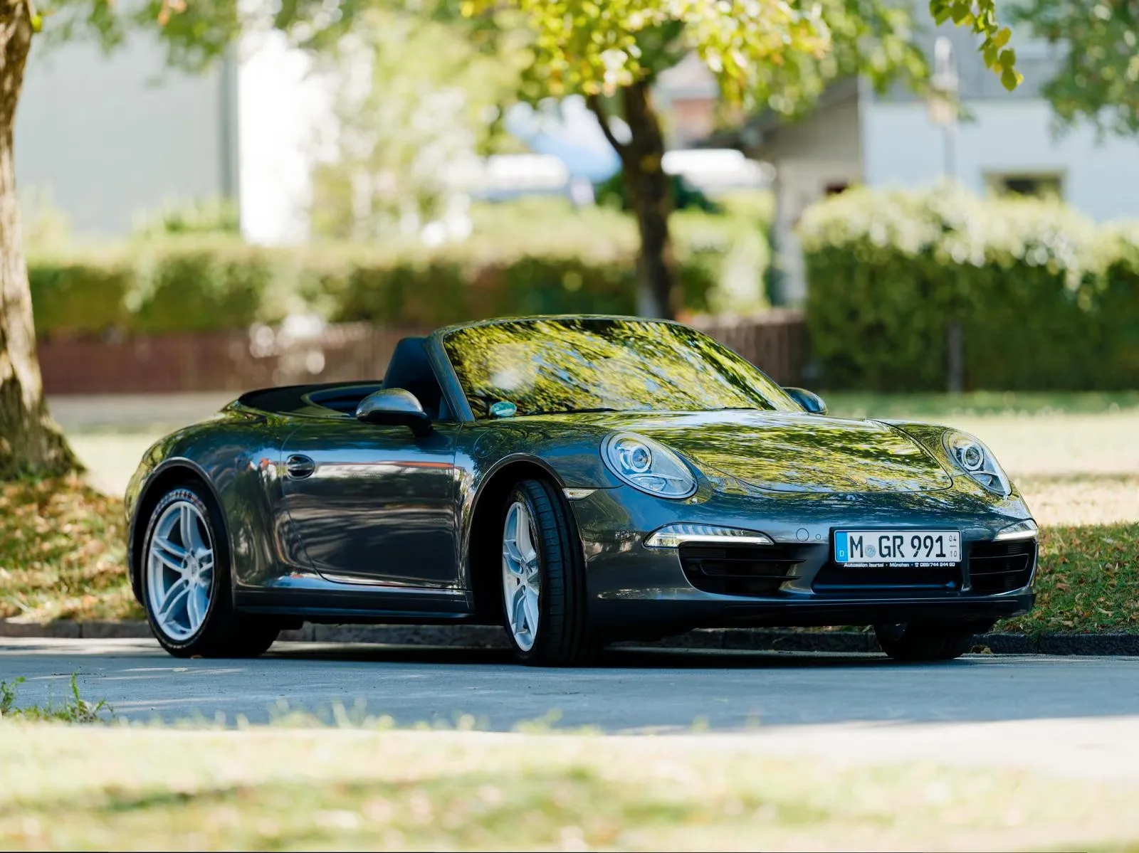 2013 Porsche 911 Carrera 4 Cabriolet 991 offered by a specialist dealer in Ismaning, Germany, main photo