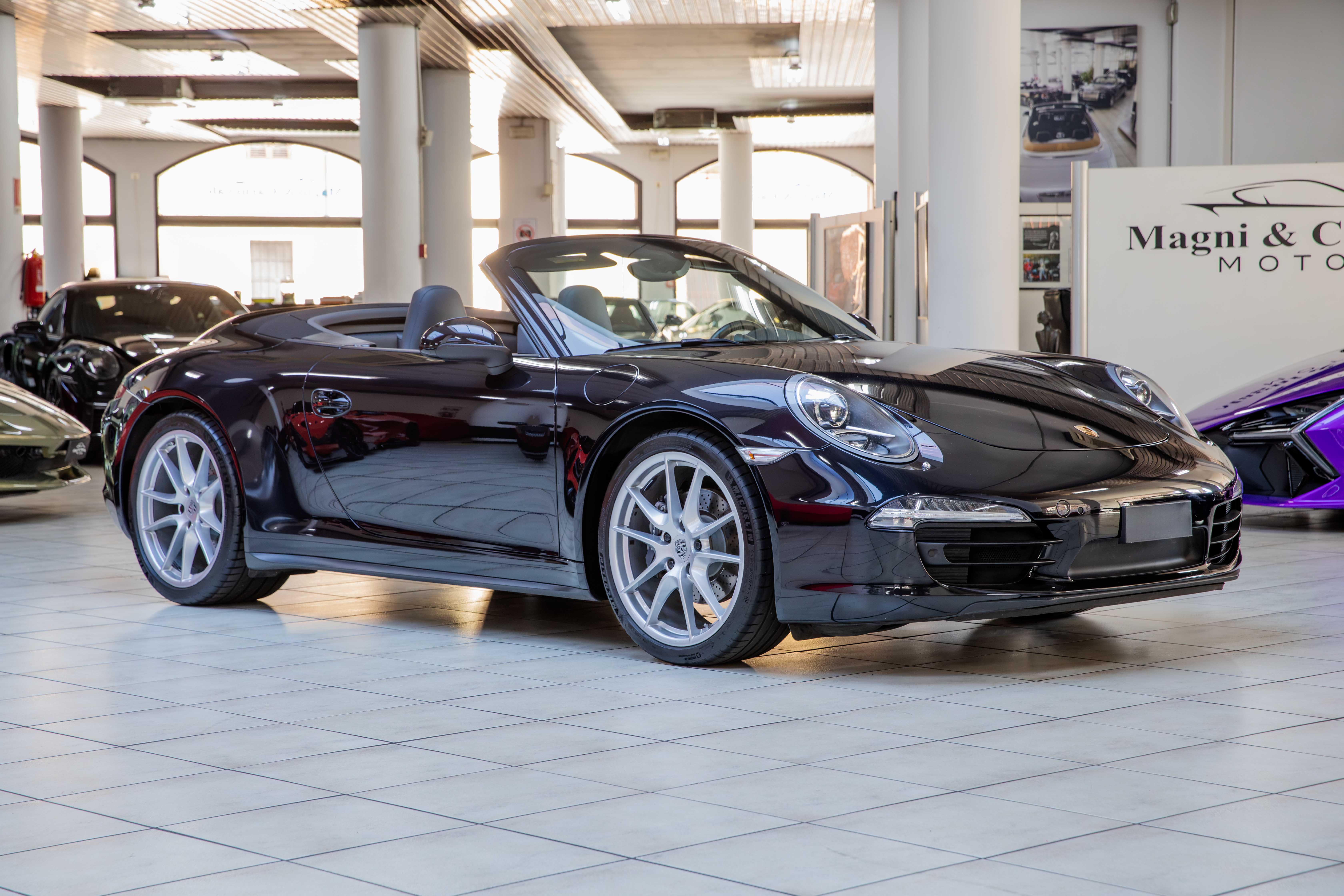 2015 Porsche 911 Carrera 4 Cabriolet offered by a specialist dealer in Milan, Italy, photo 4 of 20