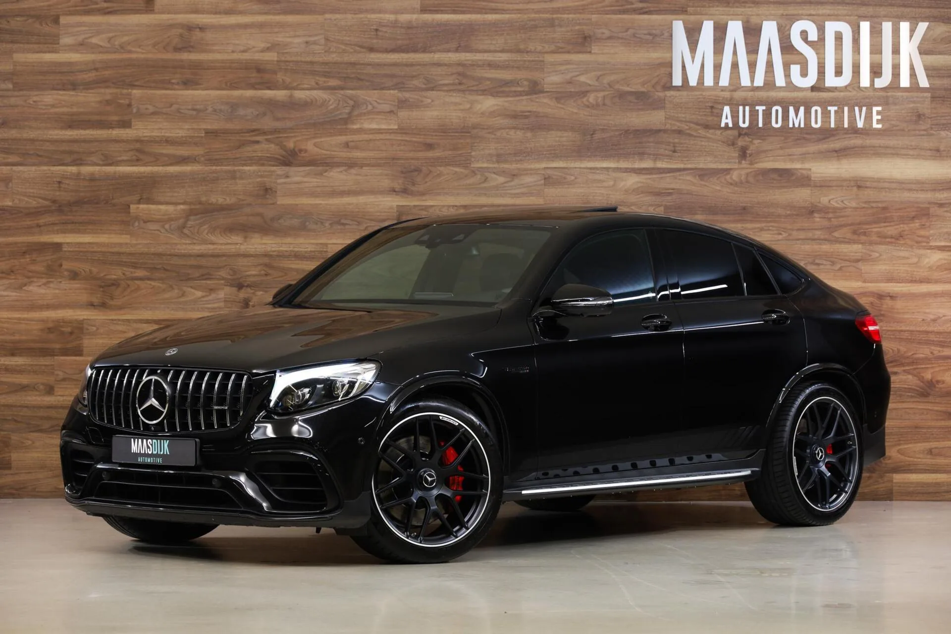 2018 Mercedes-AMG GLC 63 S Coupé proposée par un concessionnaire spécialisé à Werkendam, Pays-Bas, photo principale