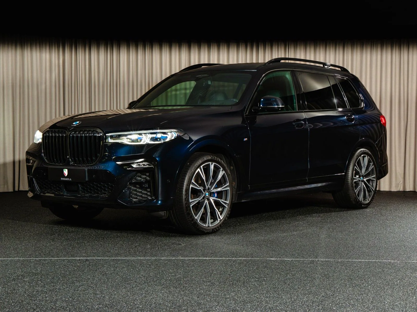 2020 BMW X7 M50i offered by a supercar dealer in Kongens Lyngby, Denmark, main photo