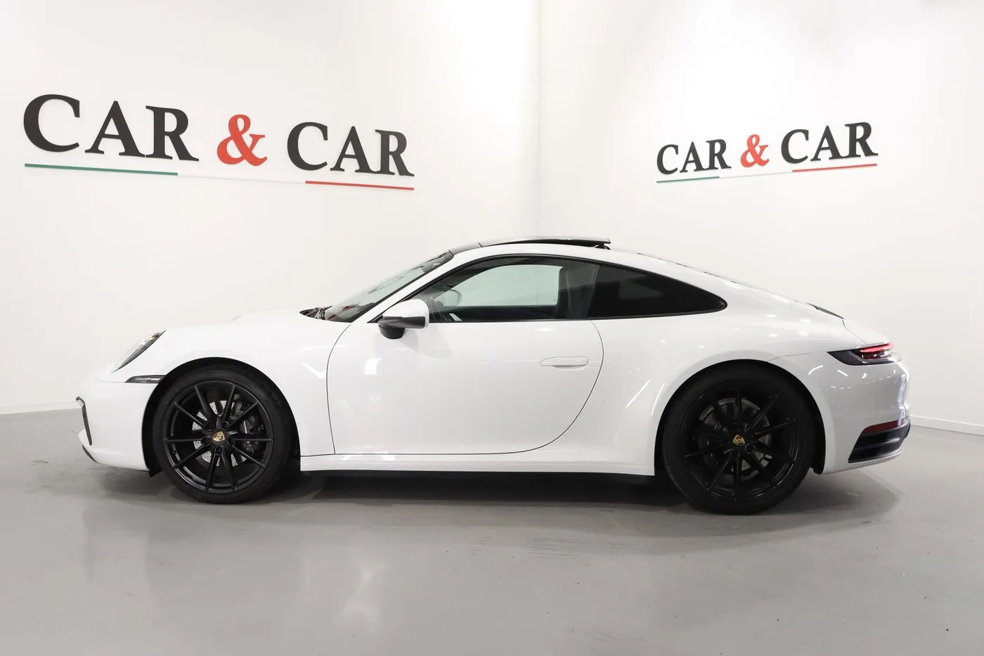 2020 Porsche 911 Carrera 4 proposée par un spécialiste de la supercar à Zibido San Giacomo, Italie, photo 6 sur 25