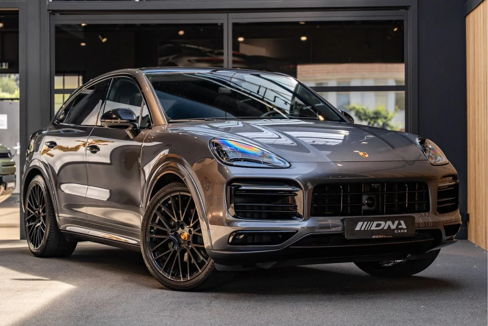 2020 Porsche Cayenne E-Hybrid Coupé offered by a specialist dealer in Naarden, Netherlands, main photo