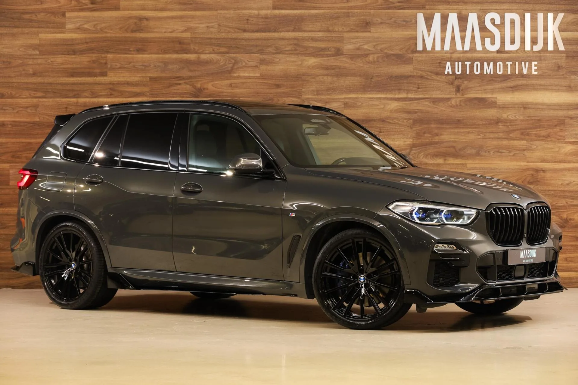 2022 BMW X5 xDrive45e M Sport offered by a specialist dealer in Werkendam, Netherlands, main photo