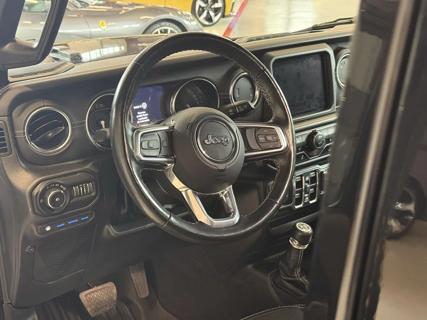 2022 Jeep Wrangler Unlimited 4xe, Sahara offered by a specialist dealer in Lucca, Italy, photo 23 of 25