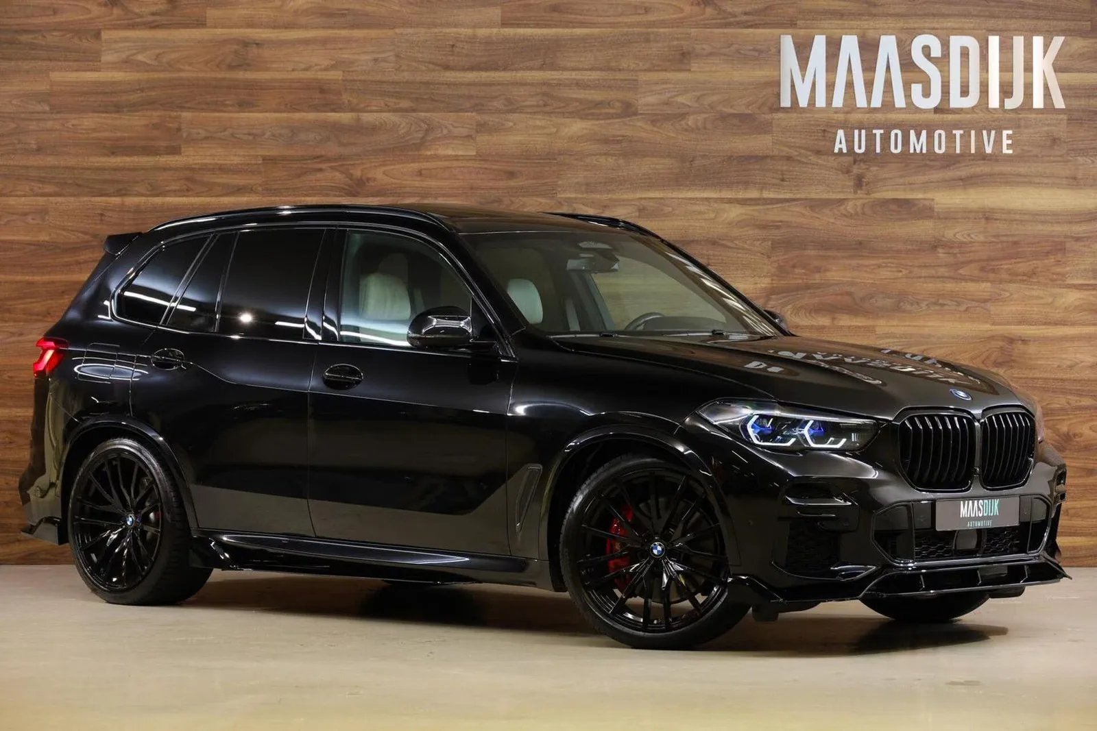 2023 BMW X5 xDrive45e M Sport offered by a specialist dealer in Werkendam, Netherlands, main photo