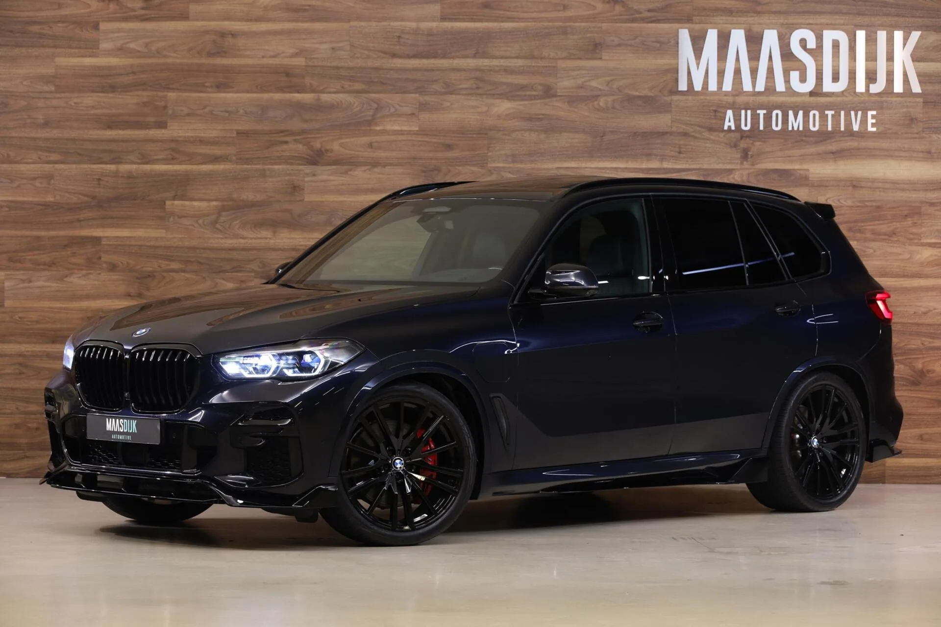 2023 BMW X5 xDrive45e M Sport offered by a specialist dealer in Werkendam, Netherlands, main photo