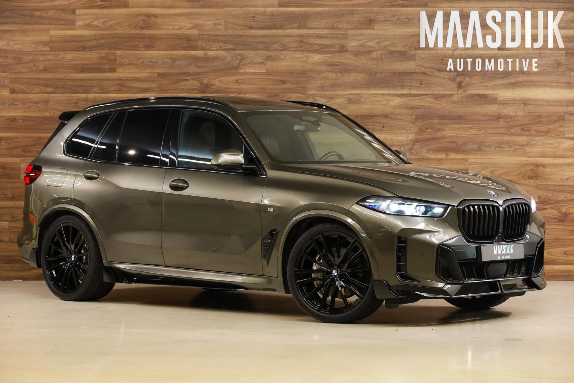 2023 BMW X5 xDrive50e M Sport Pro proposée par un concessionnaire spécialisé à Werkendam, Pays-Bas, photo principale