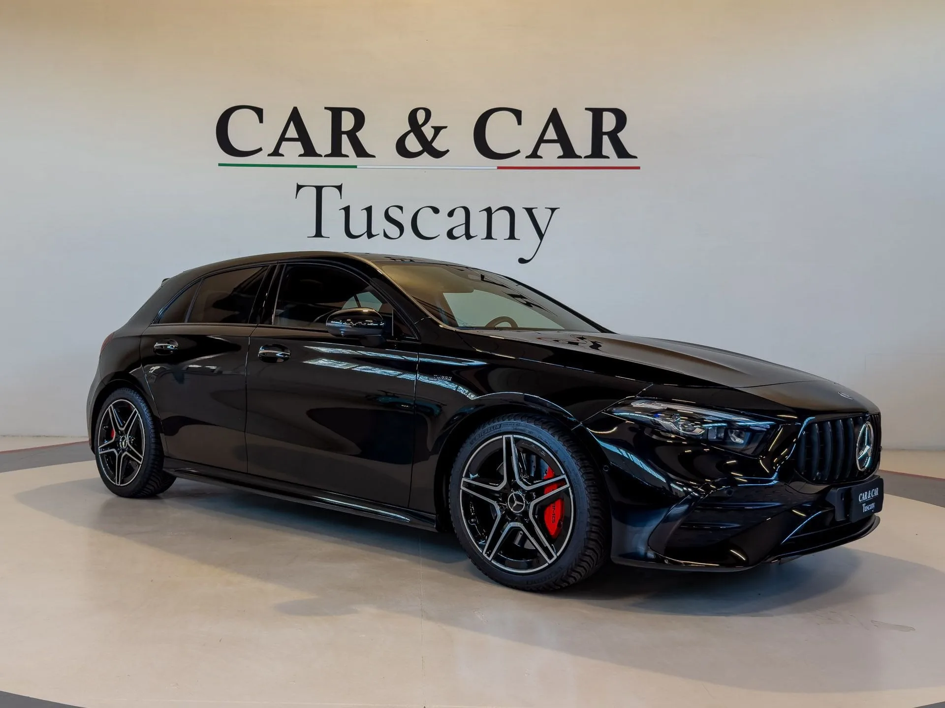 2023 Mercedes-AMG A 35 4MATIC in black at Car & Car Tuscany in Lucca, Italy, front three-quarter view