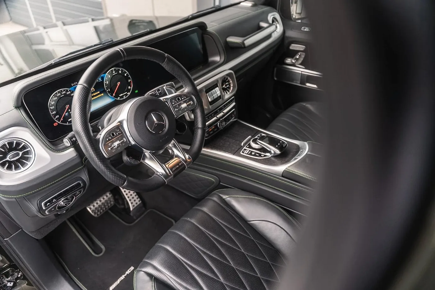 2023 Mercedes-AMG G 63 MANUFAKTUR offered by a supercar dealer in Munich, Germany, photo 8 of 22