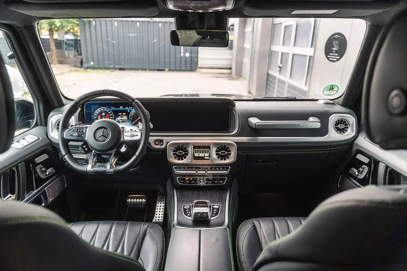 2023 Mercedes-AMG G 63 MANUFAKTUR offered by a supercar dealer in Munich, Germany, photo 14 of 22