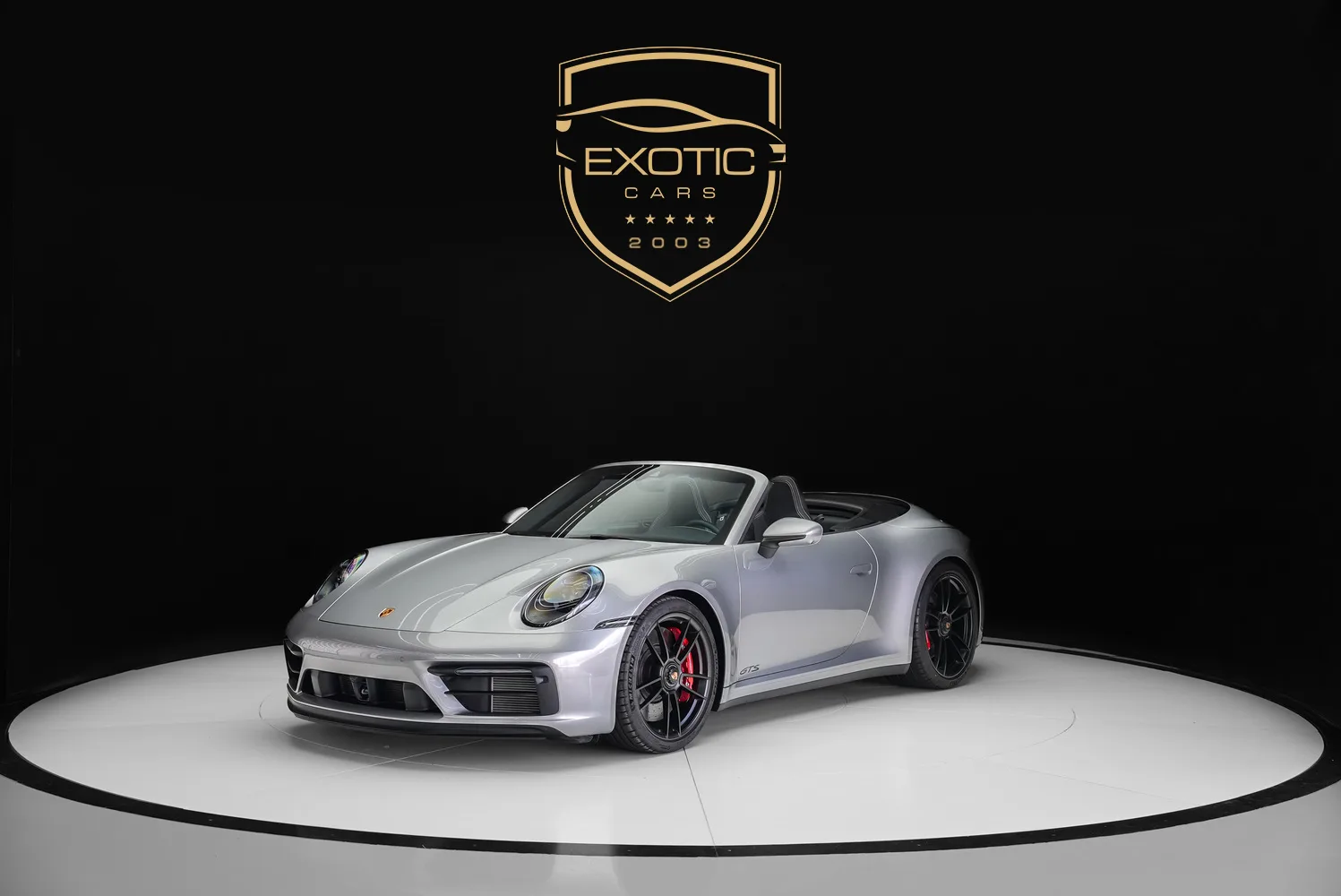 2023 Porsche 911 Carrera GTS Cabriolet proposée par un concessionnaire spécialisé à Dubaï, Émirats arabes unis, photo principale