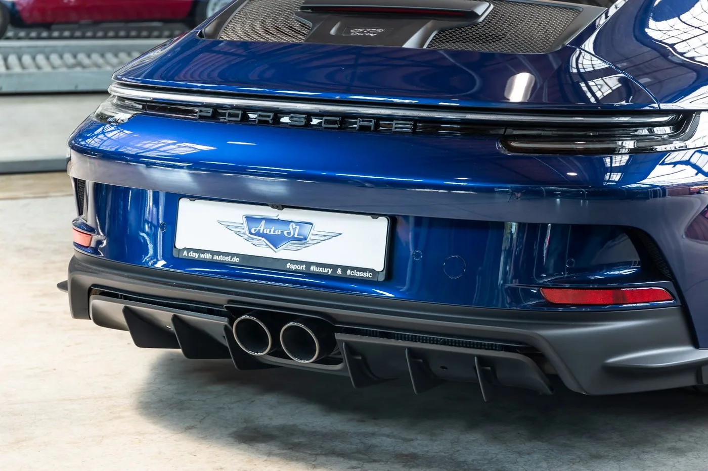 2023 Porsche 911 GT3 Touring offered by a specialist dealer in Neuss, Germany, photo 9 of 10