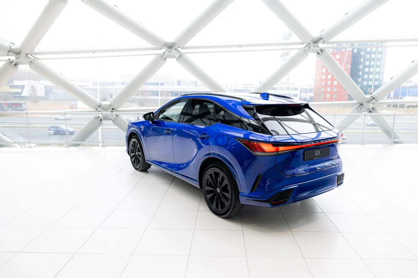2024 Lexus RX 500h F Sport offered by an official McLaren and Morgan dealer in Utrecht, Netherlands, photo 2 of 25