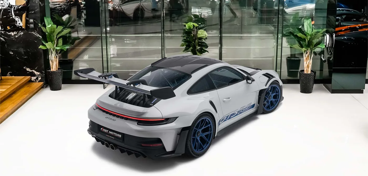 2024 Porsche 911 GT3 RS Weissach package offered by a specialist dealer in Dubai, United Arab Emirates, exterior view 2