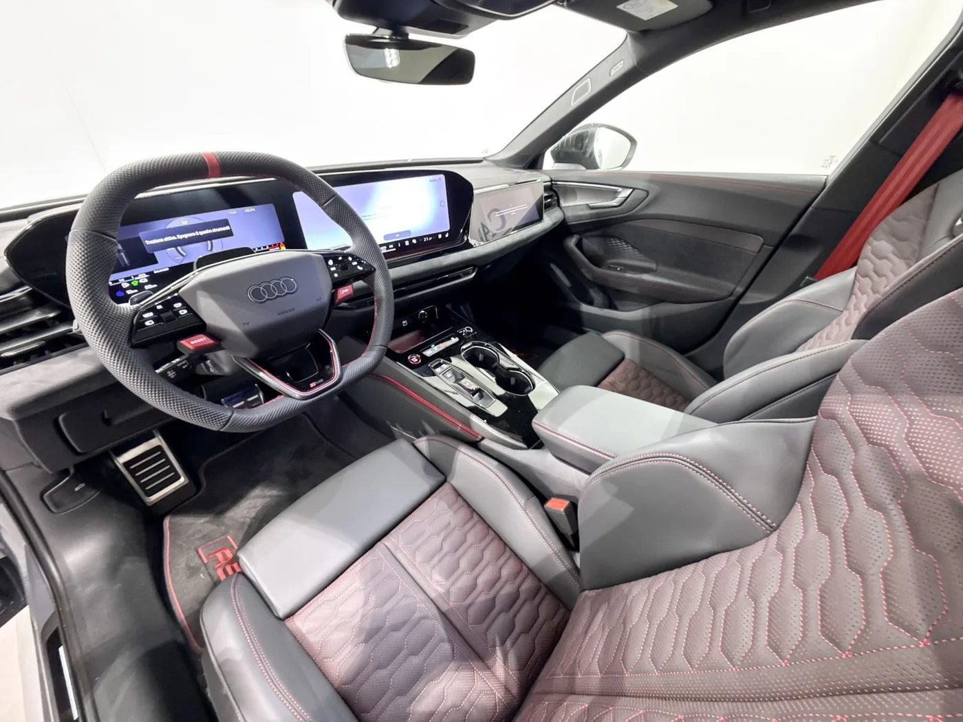 2026 Audi RS5 Avant e-hybrid, quattro offered by a supercar dealer in Zibido San Giacomo, Italy, photo 16 of 23