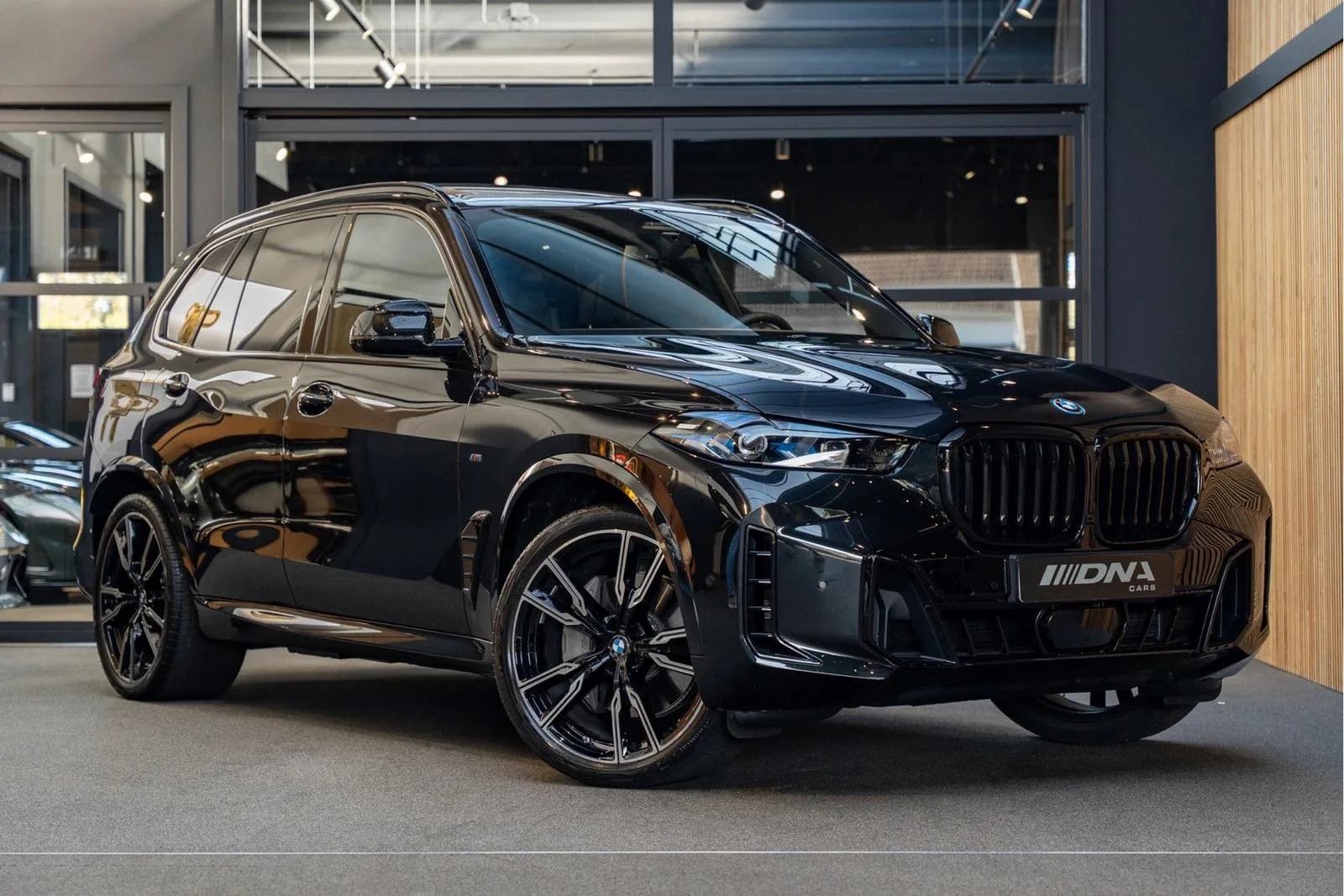 2026 BMW X5 xDrive50e M Sport offered by a specialist dealer in Naarden, Netherlands, main photo