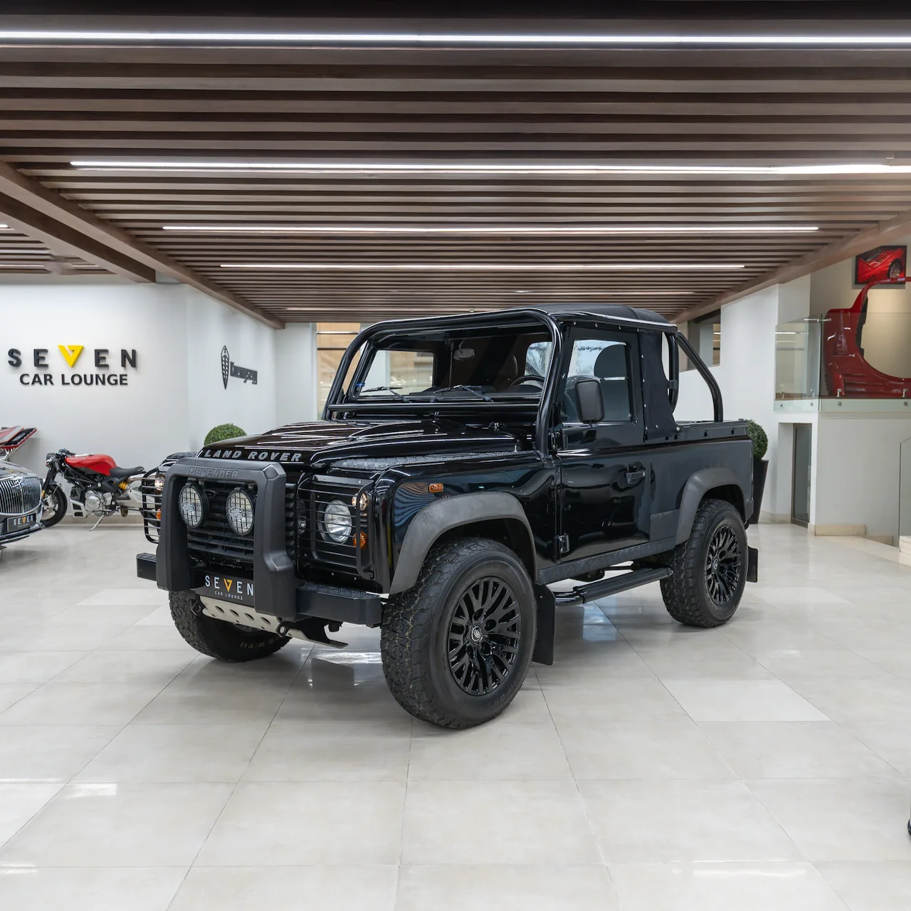 Land Rover Defender 90 offered by a supercar dealer in Riyadh, Saudi Arabia, main photo
